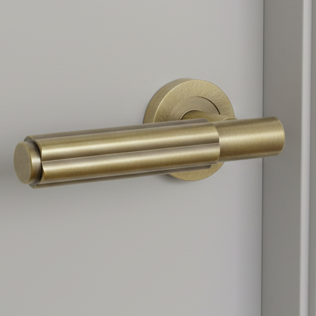 Antique Brass Bloom Lever on Rose Door Handles JV848AB