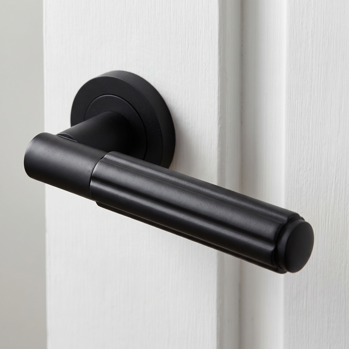 Matt Black Bloom Lever on Rose Door Handles JV848MB