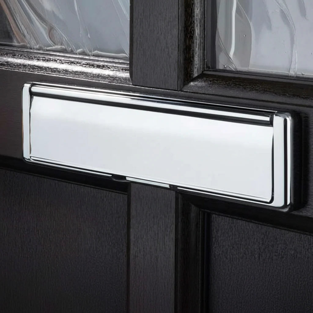 Chrome letter plate fitted to a front door
