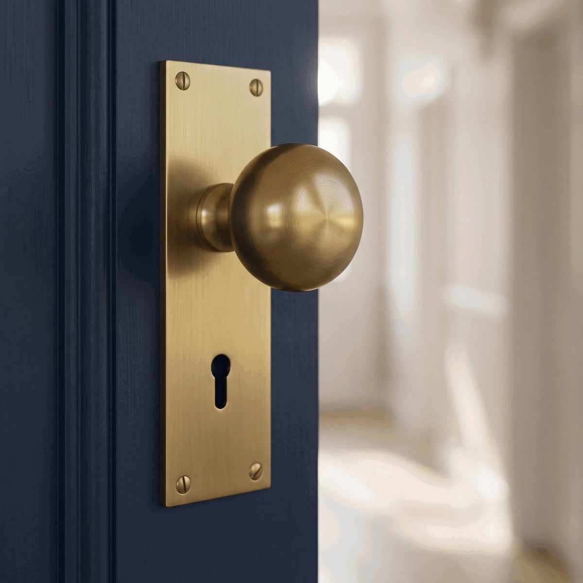 Heritage Balmoral Antique Brass Knob on Lock Plate