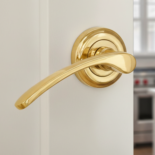 Sophia Polished Brass Curved Lever on Round Rose