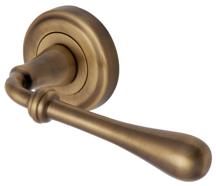 Roma Distressed Brass Decorative Lever on Round Rose