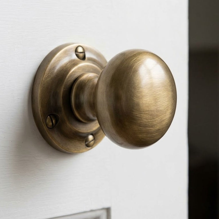 Heritage V980 Antique Brass Victoria Door Knobs 57mm
