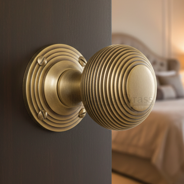 Heritage V971 Antique Brass Reeded Door Knobs 60mm