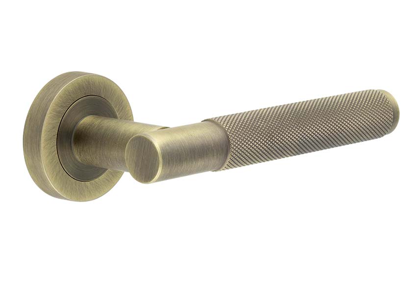 Bari Knurled Lever on Rose Antique Brass Door Handles