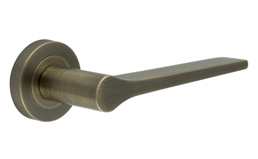 Geo Tapered Lever on Rose Antique Brass Door Handles