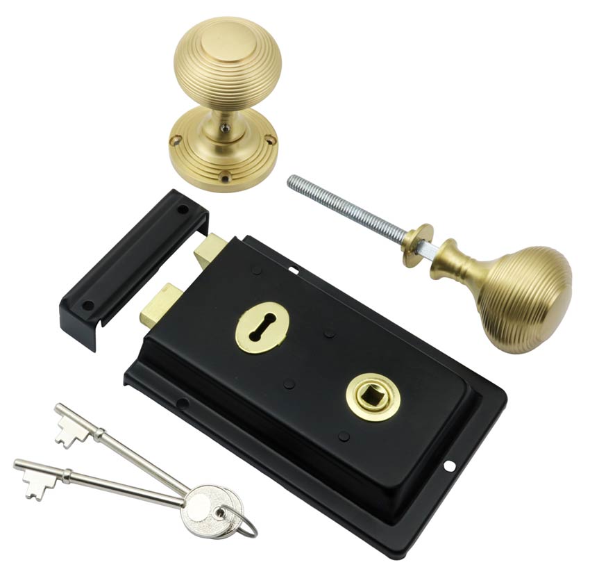 Black Rim Lock and Satin Brass Reeded Rim Knob Set