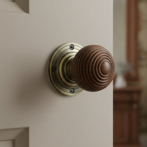 Antique Brass and Rosewood Reeded Door Knobs