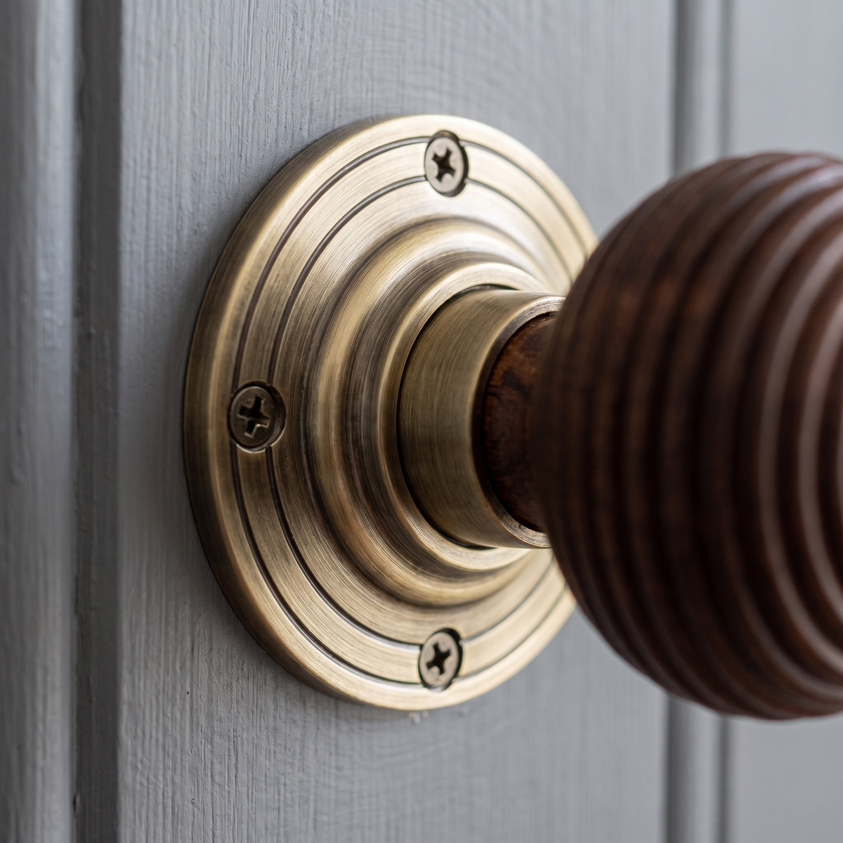 Antique Brass and Rosewood Reeded Door Knobs