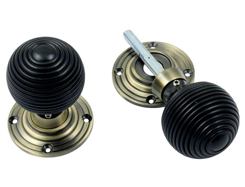 Antique Brass and Black Ebony Reeded Door Knobs