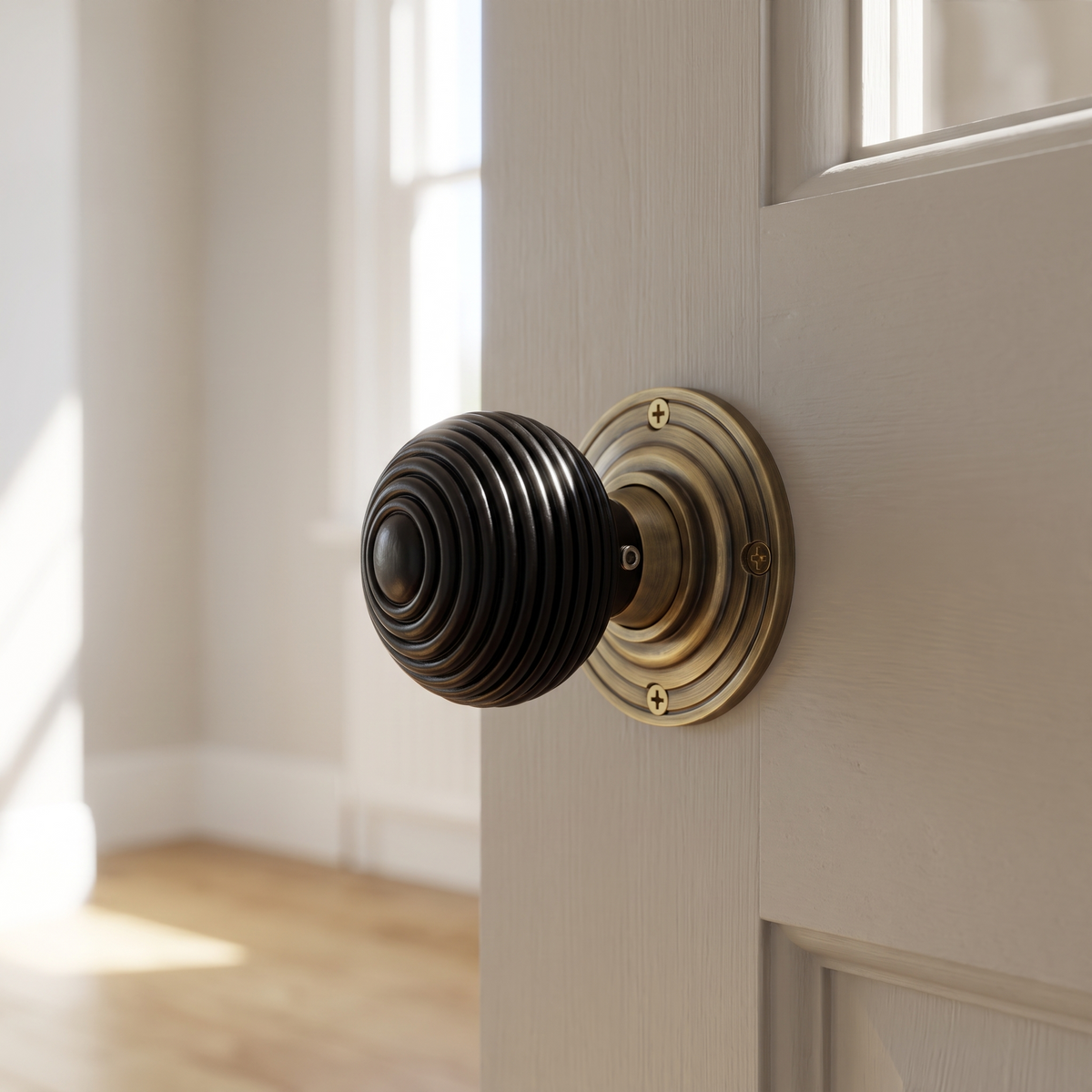 Antique Brass and Black Ebony Reeded Door Knobs