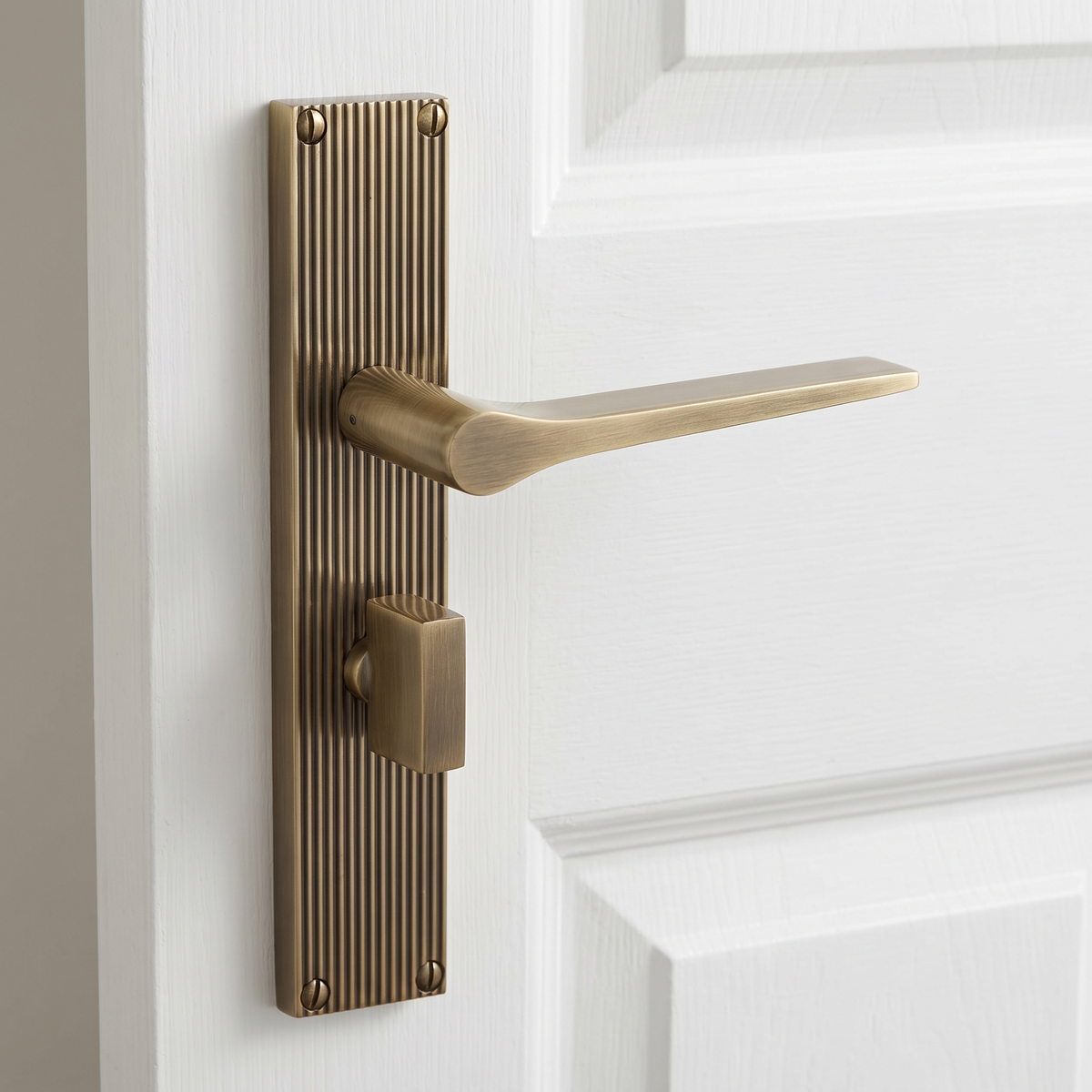 Gio Reeded Antique Brass Bathroom Door Handles RR4730