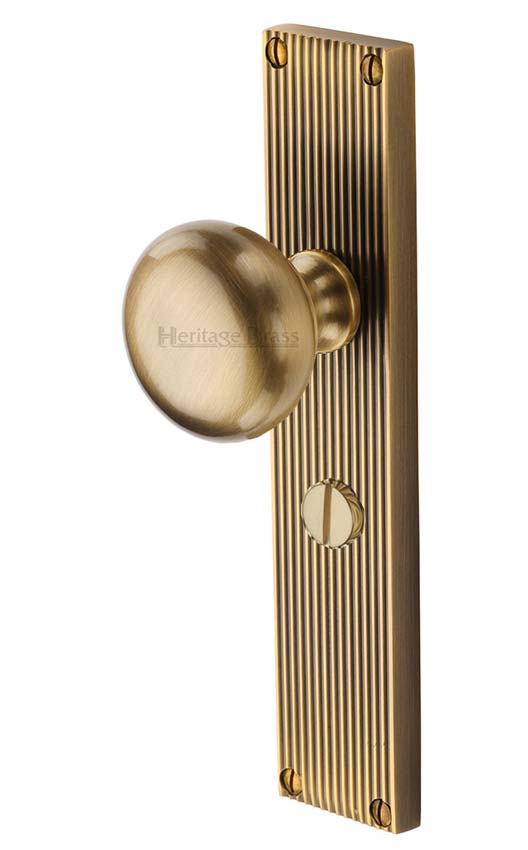 Antique Brass Victoria Knob on Reeded Bathroom Plate V9230-AT