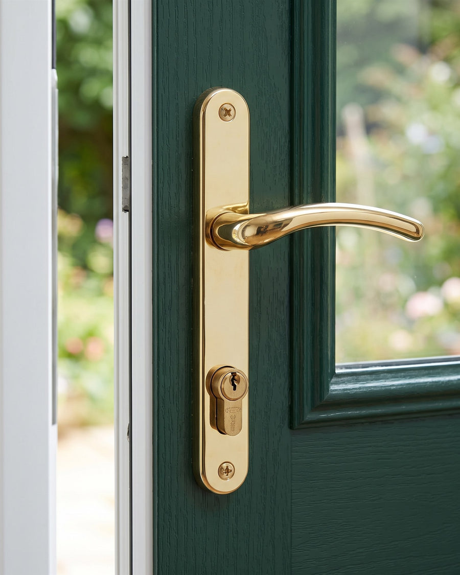 Hardex gold Balmoral multipoint lever handle with euro cylinder on a green composite door