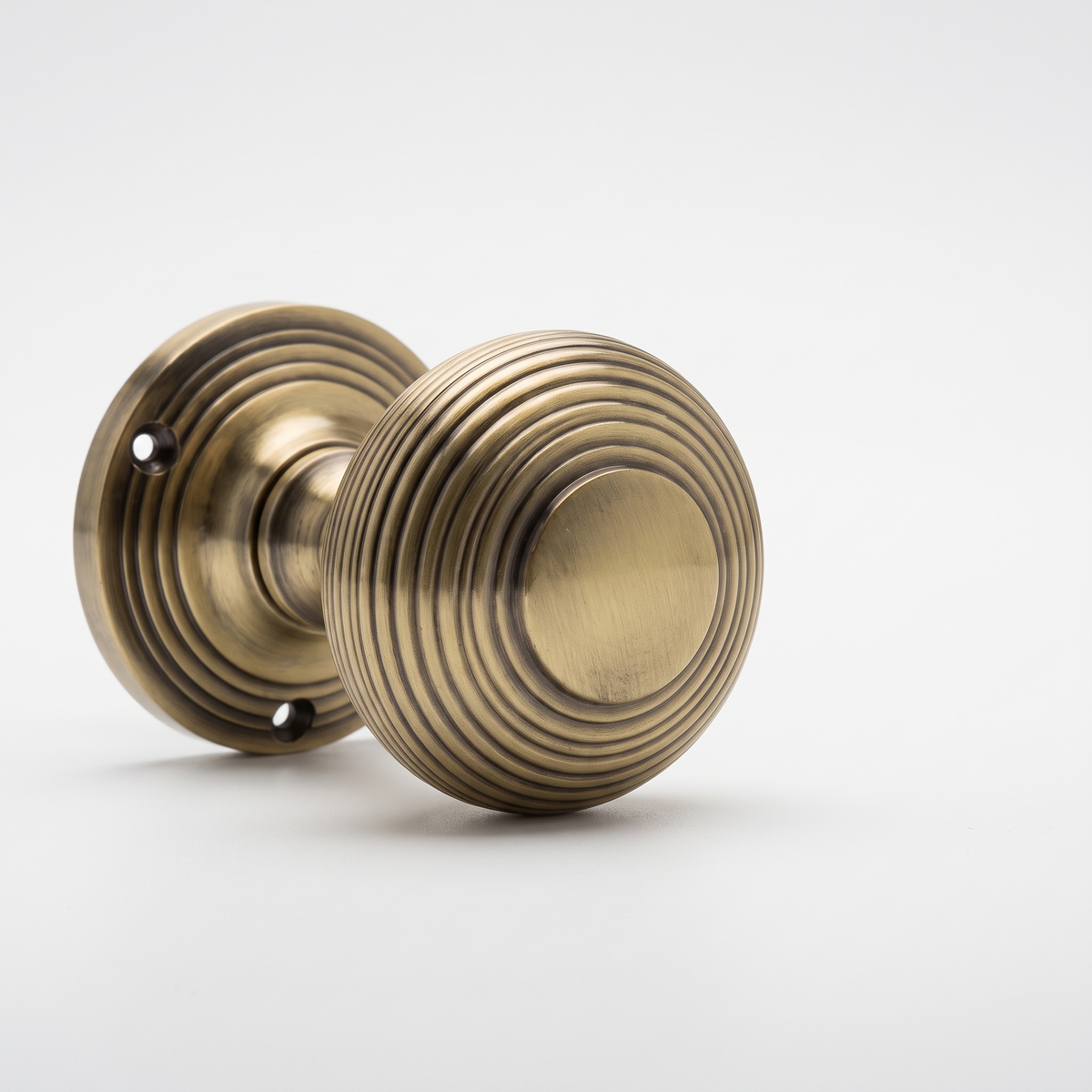 Antique Brass Reeded Rim Door Knobs 53mm