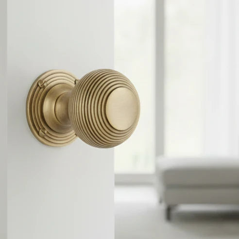 Antique brass reeded door knob