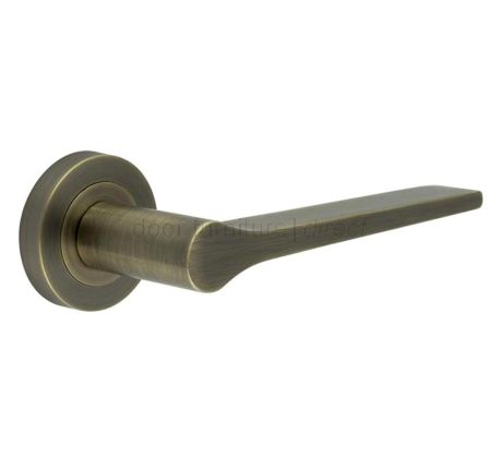 Geo Tapered Lever on Rose Antique Brass Door Handles
