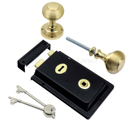 Black Rim Lock and Polished Brass Reeded Rim Knob Set