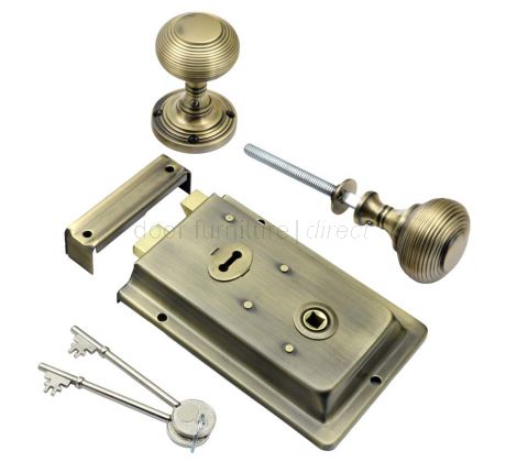 Antique Brass Rim Lock and Reeded Rim Knob Set