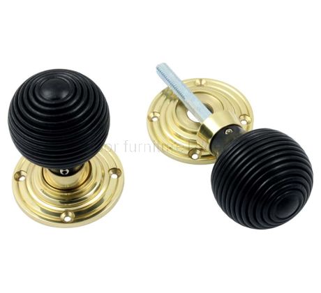 Polished Brass and Ebony Reeded Door Knobs
