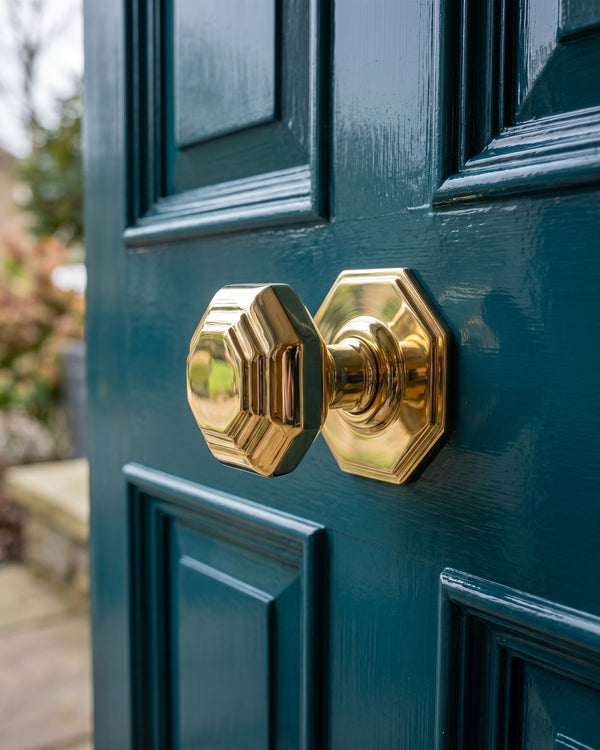 Polished brass octagonal centre door knob