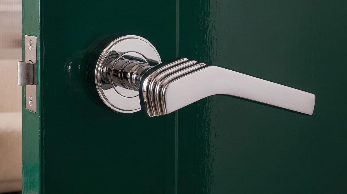 Polished chrome Tiffany Art Deco lever on a high-gloss emerald green lacquered door