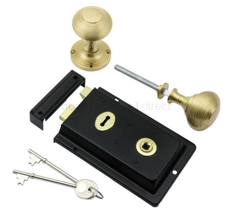 Black Rim Lock and Satin Brass Reeded Rim Knob Set