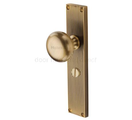Antique Brass Victoria Knob on Reeded Bathroom Plate V9230-AT
